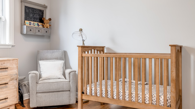 gray rocking chair in nursery