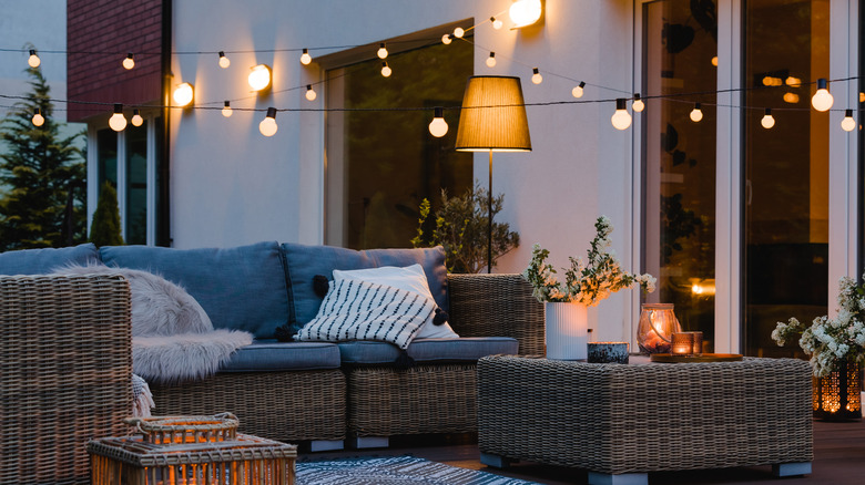 outdoor patio with couch and lights