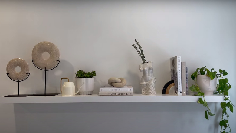 styled floating wall shelf