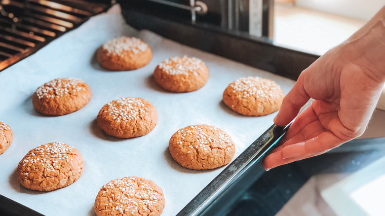 Why You Shouldn't Get Rid Of Your Old Baking Sheets