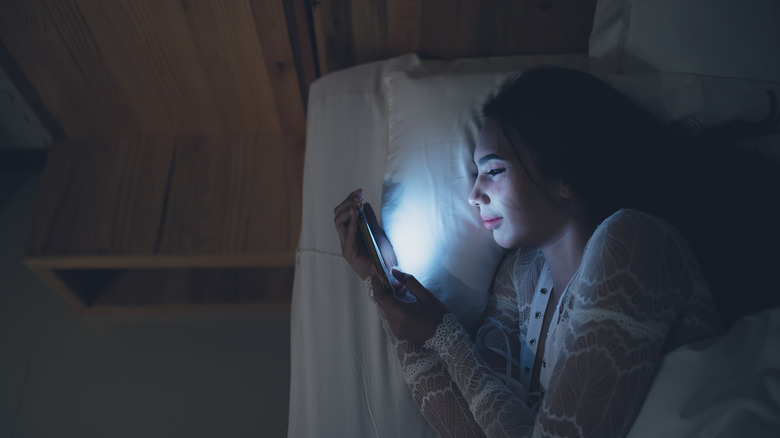 girl looking at phone 