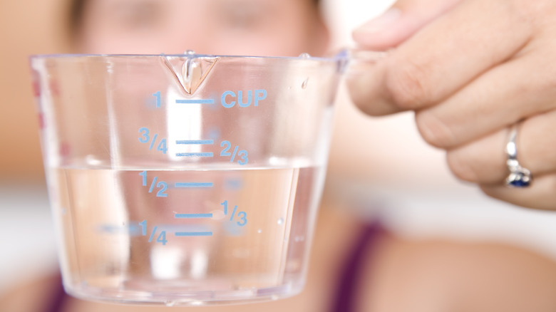 measuring cup with water