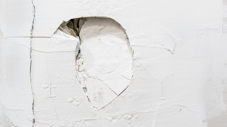 punched hole in a wall