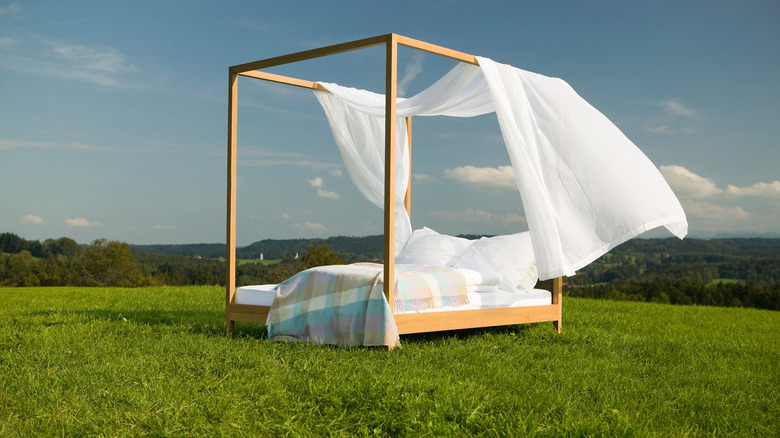 four-poster bed outside