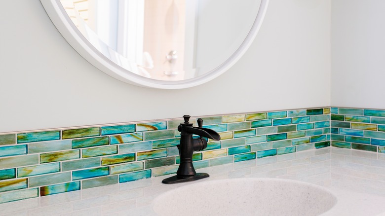 mosaic tile backsplash in bathroom