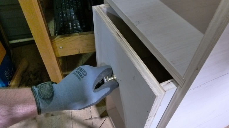Testing newly installed drawer pull