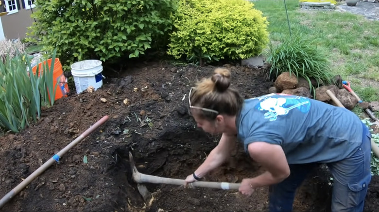 shoveling to make waterfall