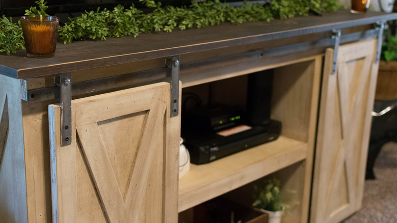 barn door cabinets on console