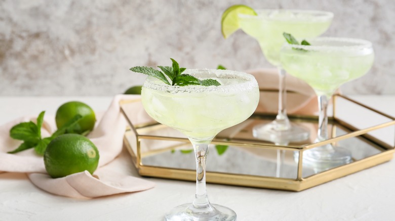 prepared cocktails in glass tray