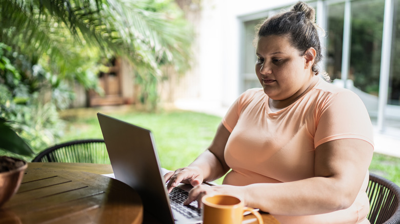 woman sending emails