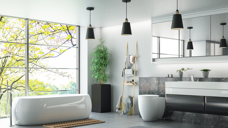 Bathroom with three black pendants