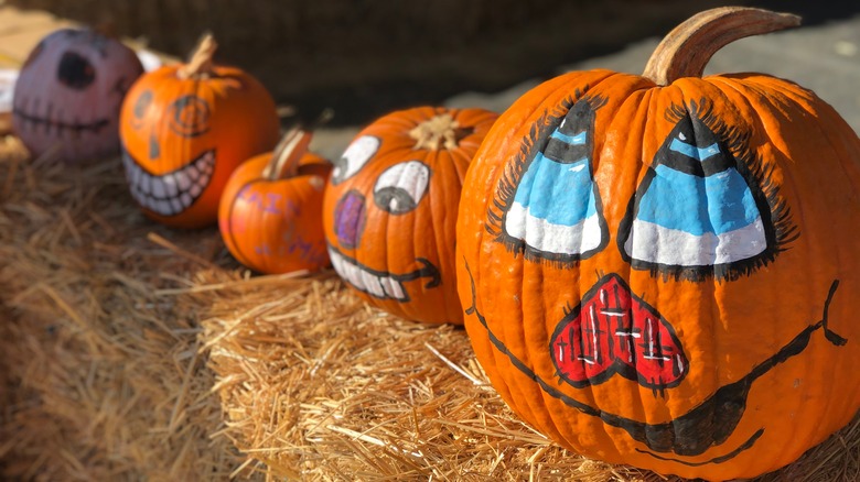 Pumpkins with painted faces