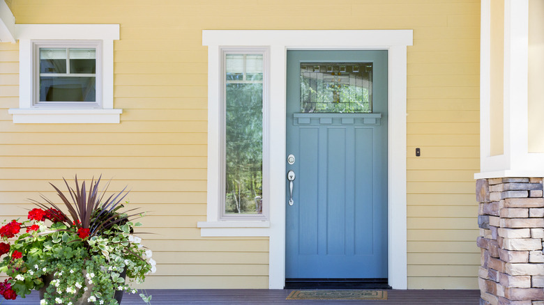 front entrance to yellow home