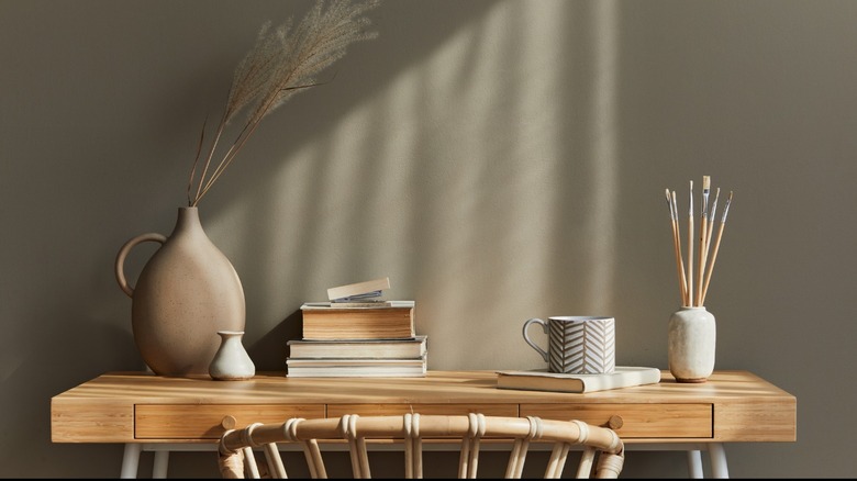 Desk against taupe wall