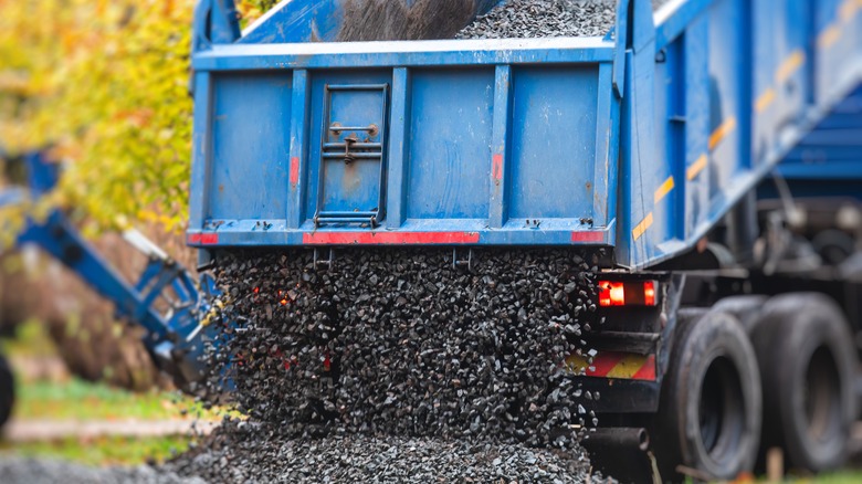 Truck dumping gravel