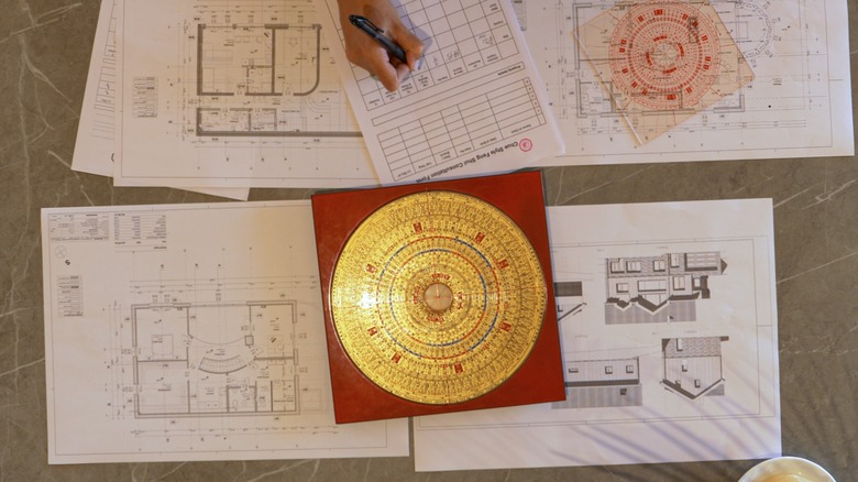 feng shui compass on blueprints