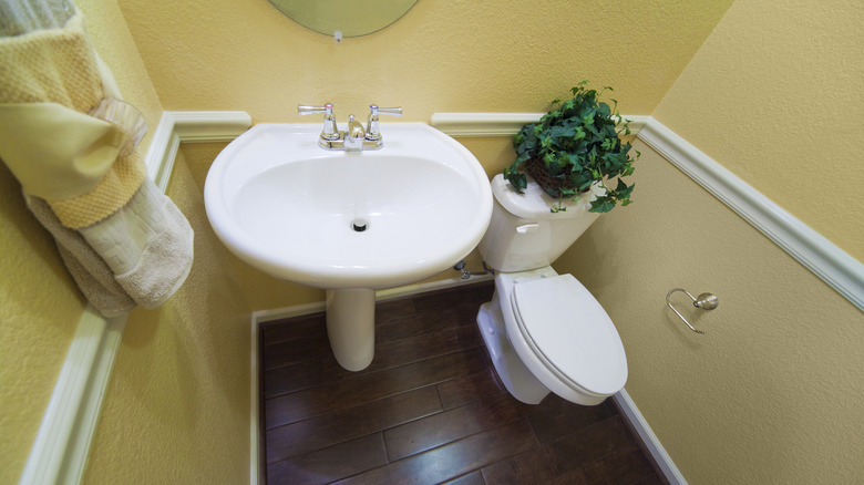 Small bathroom. Hard to fit into the toilet space in between the