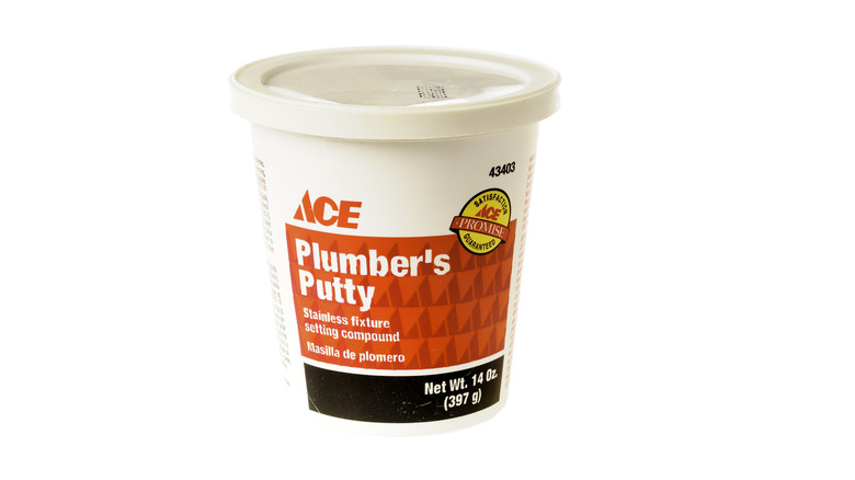 Tub of Ace plumber's putty