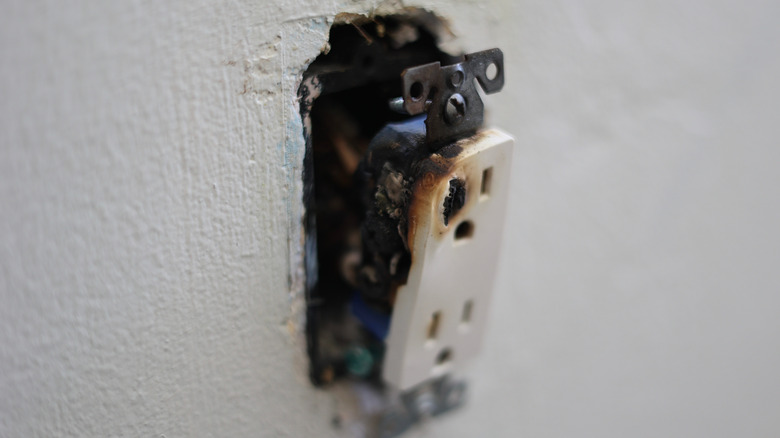 A charred electrical outlet