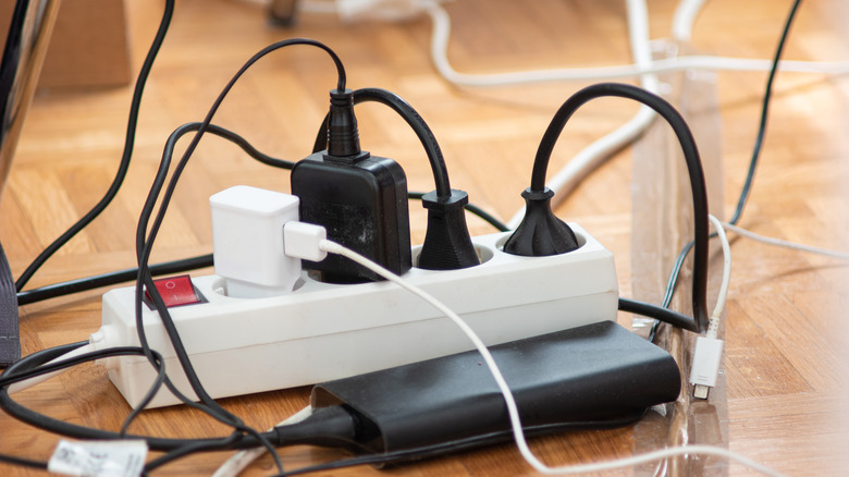 Tangled cords on power strip