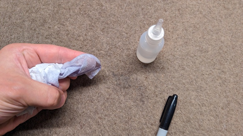 Removing permanent marker stain with rubbing alcohol on beige carpet