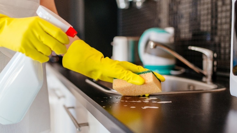 Cleaning a countertop with spray