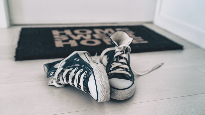 shoes outside on the door mat