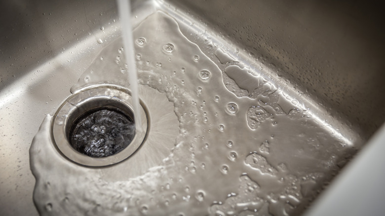 water running in garbage disposal