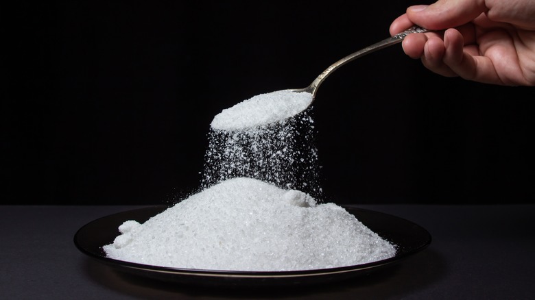 Spoon and pile of salt