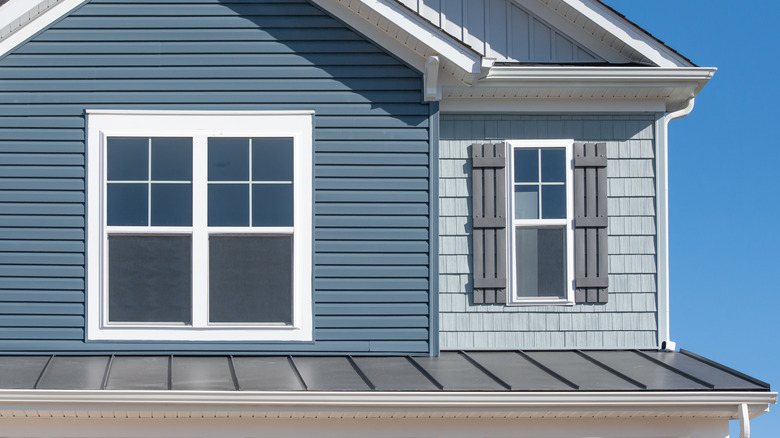 Metal roof on blue house