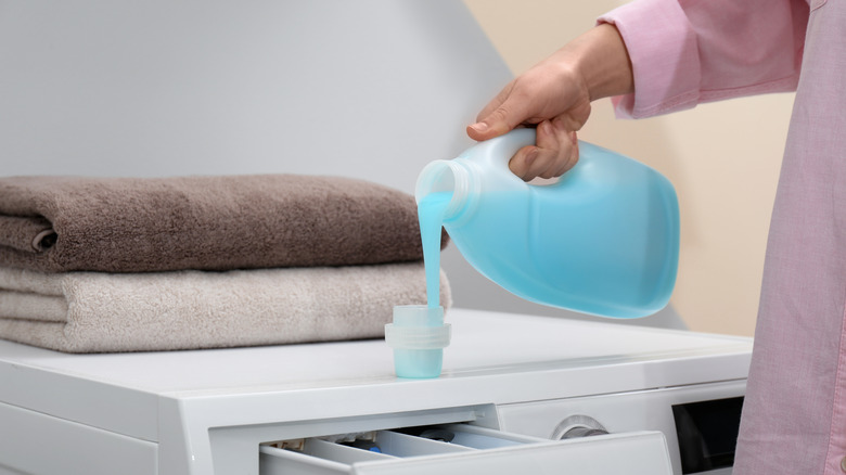 hand pouring fabric softener