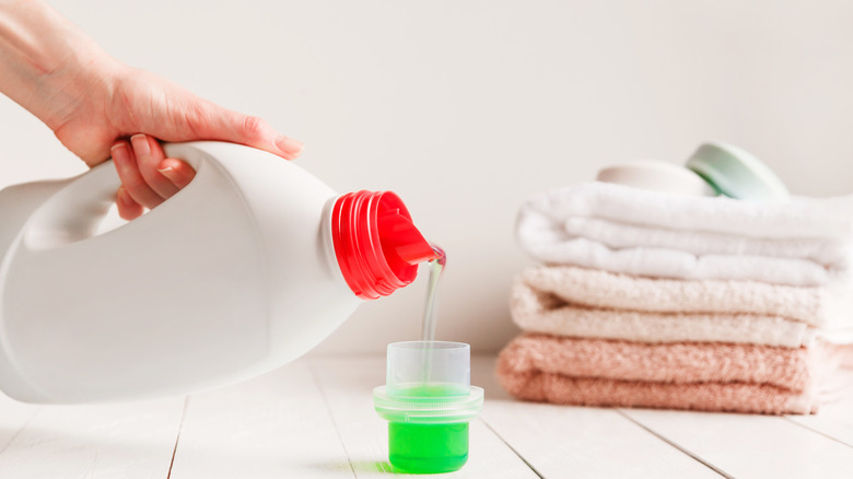 fabric softener being poured