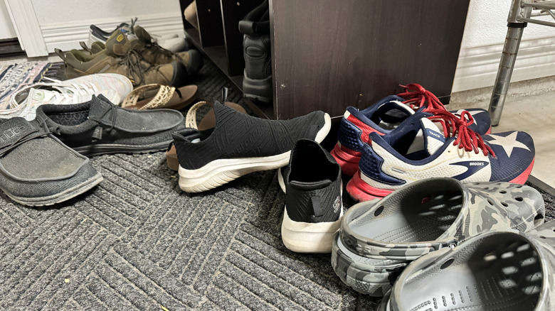 Shoes are scattered on the floor.