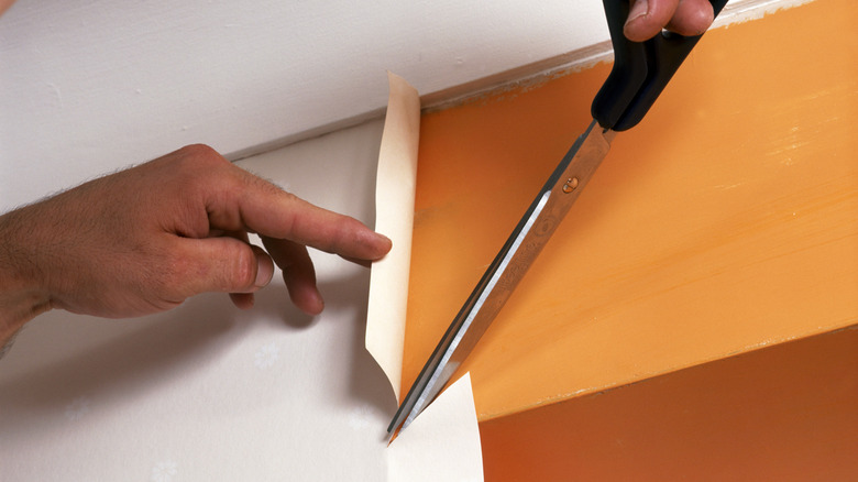 wallpaper edges being trimmed