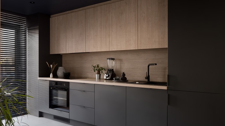 Efficient black one-wall kitchen