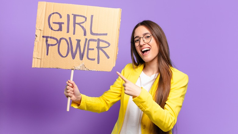 woman with girl power sign