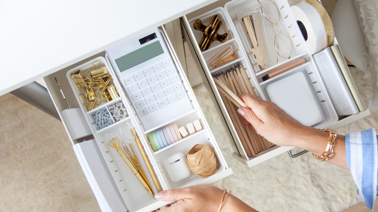 organized drawer of office supplies