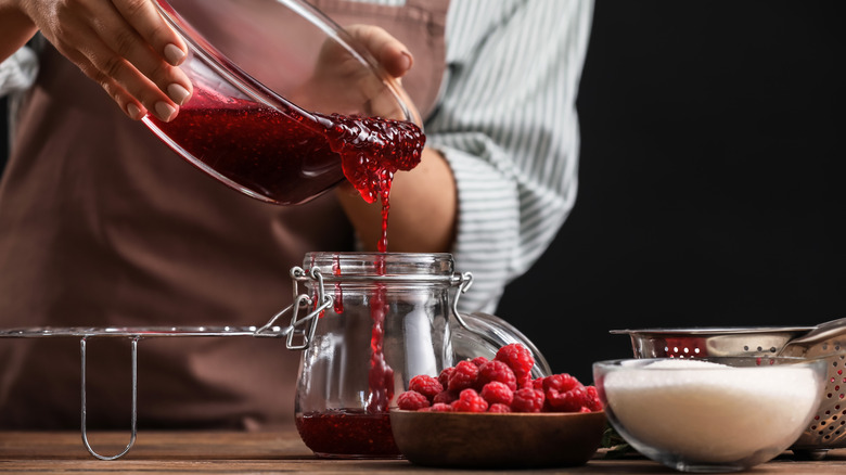 Cook makes raspberry preserves