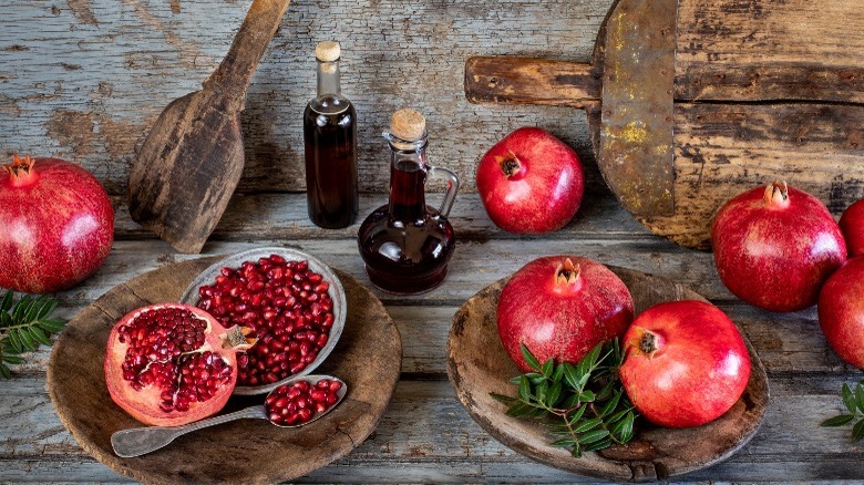 Selection of pomegranates on a wooden table