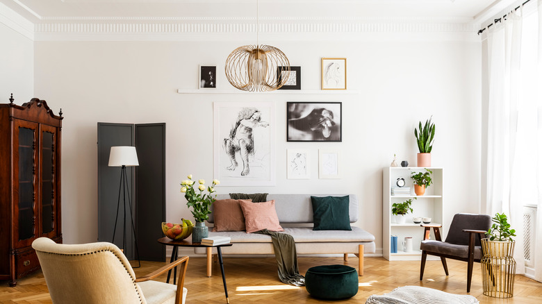 Room with black-and-white gallery wall