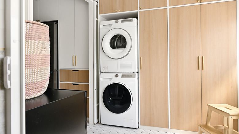 A washer and dryer unit in a laundry room