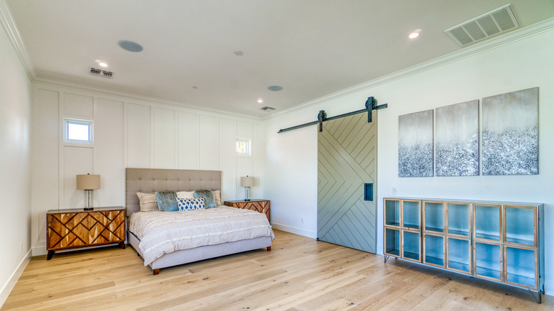 unique barn door in bedroom