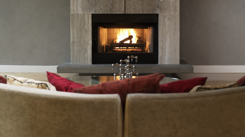 red pillows and fireplace