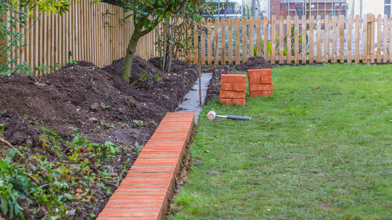 Partially installed brick edging