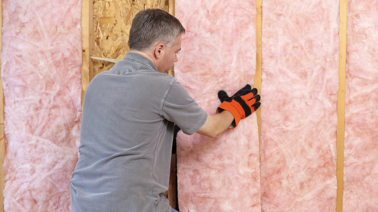 Installing fiberglass batt insulation