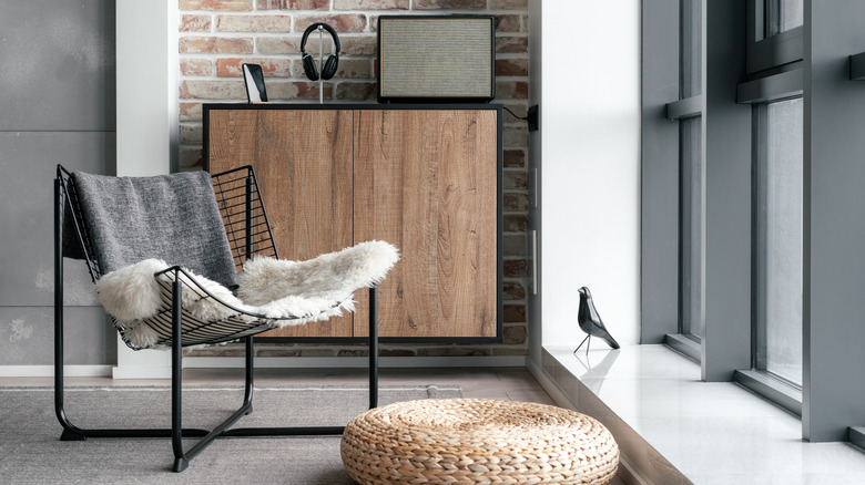 Speaker on shelf of room