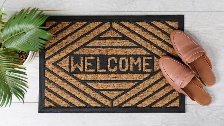 Welcome mat with shoes