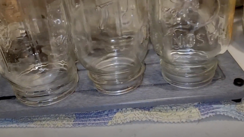 jars drying on diatomite tray