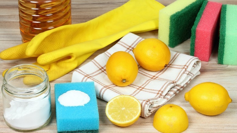 Lemons, cream of tartar, sponges, yellow glove