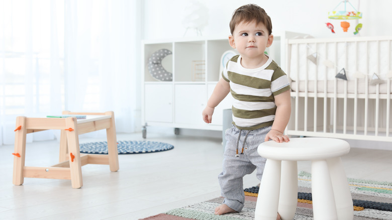 Toddler with step stool 